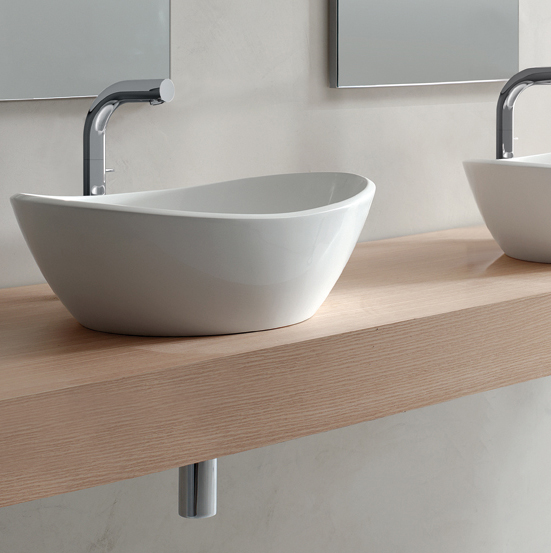 Victoria + Albert Amalfi 55 basin in volcanic limestone is distributed in Quenesland by Luxe by Design, Brisbane.