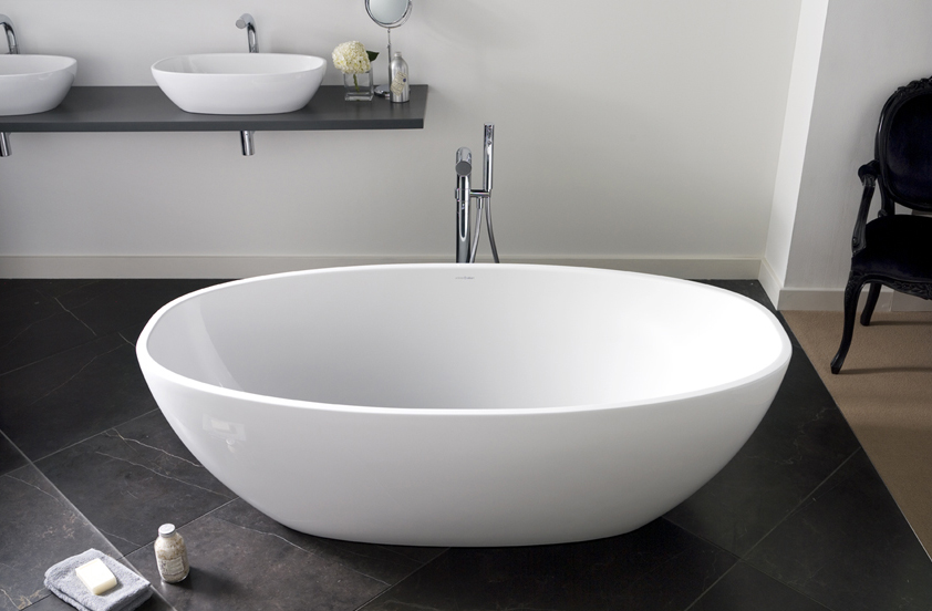 Victoria + Albert Barcelona bath in volcanic limestone is distributed in Quenesland by Luxe by Design, Brisbane.