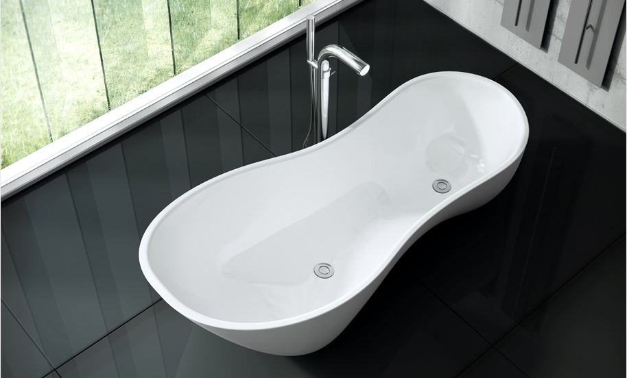 Victoria + Albert Cabrits bath in volcanic limestone is distributed in Quenesland by Luxe by Design, Brisbane.