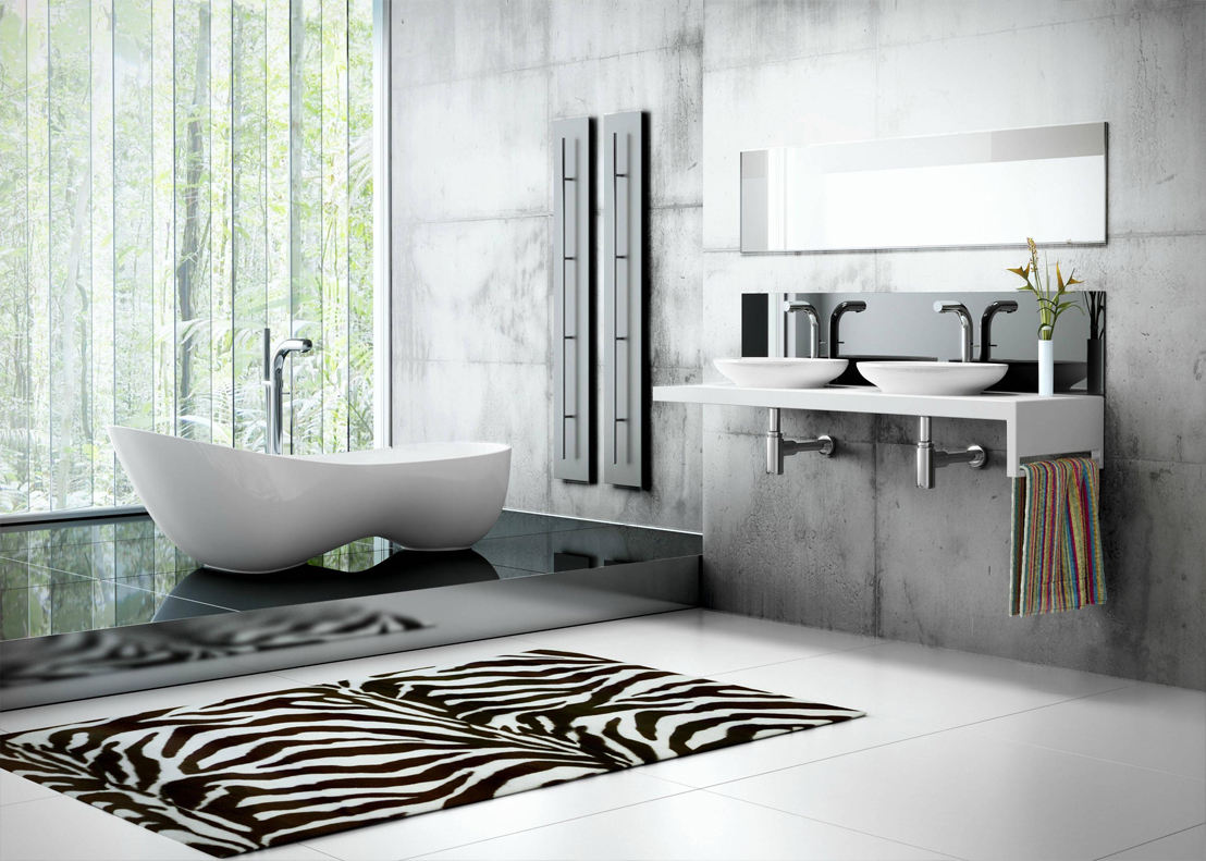 Victoria + Albert Cabrits bath in volcanic limestone is distributed in Quenesland by Luxe by Design, Brisbane.