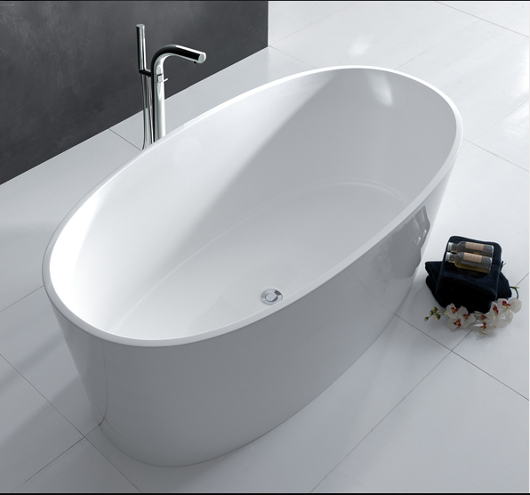 Victoria + Albert Ios bath in volcanic limestone is distributed in Quenesland by Luxe by Design, Brisbane.