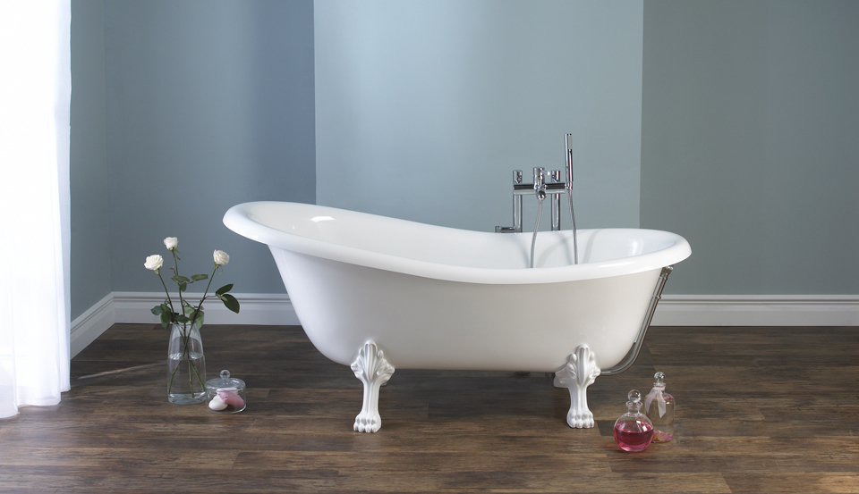 Victoria + Albert Roxburgh traditional bath in volcanic limestone is distributed in Quenesland by Luxe by Design, Australia.