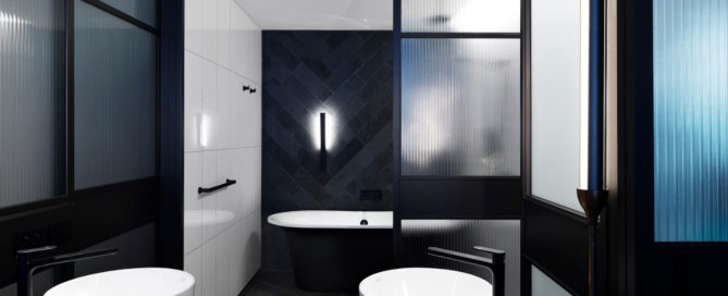 QT Melbourne Hotel features Victoria + Albert Monaco matte black freestanding bath, imported and supplied by Luxe by Design Australia.
