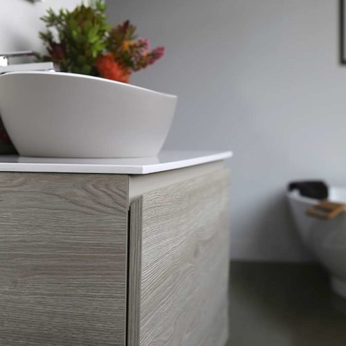 Kokoon Quantum rovere sherwood scuro cabinet with smooth white Mineralmarmo slab top. Luxe by Design Australia, Italian bathroom vanities and furniture, Brisbane.